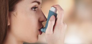 Nice Guidelines. Image of Women with Inhaler